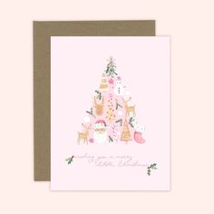 a pink christmas card with an illustrated tree