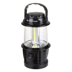 a black lantern with a light on it