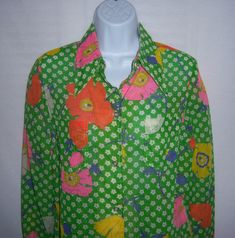 "Vintage Sirotto Sport bright green, hot pink, purple and orange mod flower floral print pattern gauze shirt and with matching cotton maxi skirt. Good pre-owned condition. No holes, stains, snags, etc. Women's size 6 or 8 or SMALL. Measurements: bust-38\", length-29\" skirt waist-28\", hips-44\", length-43\". Back button and zip closure on skirt. Super cute set!" Vibrant Green Blouse For Spring, Vibrant Green Spring Tops, Retro Green Cotton Blouse, Vibrant Green Blouse For Vacation, Green Summer Blouse For Daywear, Green Blouse With Vibrant Print, Vibrant Green Vacation Blouse, Green Printed Blouse For Daywear, Vibrant Green Floral Print Blouse