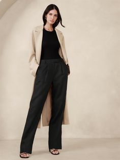 We cut this pleated pant from luxurious linen—a fabric we love because it stays cool and crisp, even in heat and humidity.  Here, we put it to use in a sleek, straight-leg pant accentuated with small pleats at the front for a beautiful drape.  High rise (10. 25") with a straight leg.  Full length.  Zip fly with book-and-bar closure.  Belt loops.  Front and back pockets.  Savannah Breeze & White: Fully lined.  *All other colors unlined.  High rise (10. 25") with a straight leg.  Full length.  Inseams: Petite/Short 28. 5", Regular 30. 5", Long/Tall 33. 5" Model: Size 2, 5'10" (178cm). Banana Republic Style, Pleated Pant, Linen Pant, Summer Linen, Banana Republic Pants, Luxury Linen, Pants Women, Pants Straight, Bottom Clothes