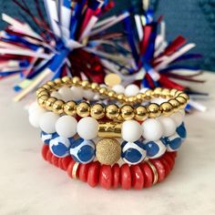 I cannot wait for 4th of July and to wear these bracelets. (each sold separately) I usually celebrate the 4th for the entire weekend, so this will get extra wearing time.  This stack is made up of Ghana red saucer beads with gold heishi beads, white jade beads with a gold star tube, blue and white tibetan beads with a 14k gold stardust bead and 14k gold ball beaded bracelet. This is a hobby turned business as I love creating jewelry with different colors, metals and textures. Thank you for takin Bracelets Red, Wooden Initials, Cord Wrap, Paper Ribbon, Summer Bracelets, White Jade, Creating Jewelry, Heishi Beads, Jade Beads