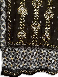 This traditional Phulkari dupatta is meticulously crafted with luxurious pure Chinon silk, featuring Gotta Patti hand embroidery. This black-hued piece is perfect for celebrations such as weddings, sangeet, jaago, and chunni ceremonies and boasts a striking metallic gold trim along the border. Effortlessly pair this dupatta with any color for an elegant contrast and make it an admirable present for birthdays or anniversaries. Material: Pure silk chinonWork: Silk thread phulkari handwork, needlew Phulkari Pants, Patiala Salwar Suits, Bridal Dupatta, Phulkari Dupatta, Gotta Patti, Black Pure, Kurta Dress, Party Wear Lehenga, Silk Dupatta