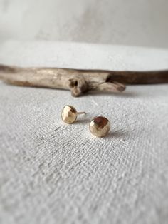 Petite and perfect, these little dainties are hand textured to give each pair a unique hammered look. Easy, comfortable and sure to be a favorite you don't want to take off!  Perfect to pair in a second hole with your other favorite earrings! Hypoallergenic. Made with 14k goldfill which does not rub off or tarnish. Simple Hammered Everyday Earrings, Simple Everyday Hammered Earrings, Hammered Minimalist Earrings As Gift, Minimalist Hammered Earrings For Gift, Minimalist Hammered Earrings As Gift, Gold Minimalist Studs For Gift, Minimalist Stud Earrings, Studs Gold, Earrings Hypoallergenic