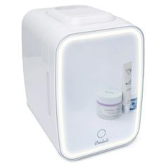 an image of a white box with some skin care products in it