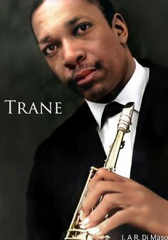 a man in a tuxedo poses for a photo while holding a trumpet with the caption trane