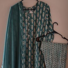 Product Description Size 42 Inches In Chest Hips 43-44 Waist 37-38 Color: Green And Off-White Pattern Floral Fabric Polyester Pants Straight With Elastic Waistband Dupatta Fabric Chiffon Extra Large Green Embroidered Cotton Palazzo Set, Fitted Green Cotton Palazzo Set, Spring Green Block Print Sets, Green Cotton Palazzo Set For Summer, Summer Green Cotton Palazzo Set, Casual Festive Block Print Sets, Green Printed Cotton Dupatta, Embroidered Kurti, Kurti Set