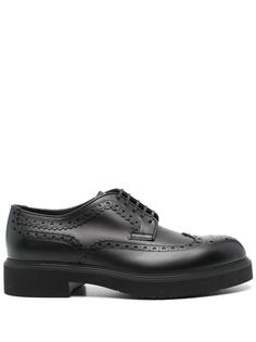 black calf leather smooth grain front lace-up fastening brogue trim round toe branded leather insole ridged rubber sole block heel This piece comes complete with a protective dust bag. Timeless Calf Leather Lace-up Shoes With Brogue Detailing, Luxury Brogue Lace-up Shoes For Derby, Calf Leather Dress Shoes With Brogue Detailing For Work, Classic Calf Leather Lace-up Shoes With Brogue Detailing, Classic Lace-up Shoes In Calf Leather With Textured Sole, Classic Lace-up Shoes With Textured Sole In Calf Leather, Wingtip Lace-up Shoes With Calf Leather And Leather Sole, Wingtip Lace-up Shoes With Calf Leather, Business Lace-up Wingtip Shoes With Textured Sole