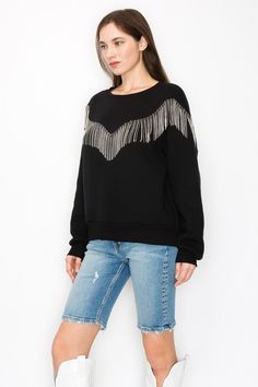 Style no. ATT1001 Introducing the exquisite "Tassel Sweater in Black," a testament to quality craftsmanship and timeless style. This sweater boasts a collection of carefully curated features that make it a standout addition to your wardrobe. Made in USA USA Fabric Machine Wash Cold Crystal Embellished Fringe Trim Ribbed Neckline, Cuffs, and Hem Fleece Lining Winter Long Sleeve Tops With Tassels, Trendy Fringe Sweater For Fall, Chic Fringe Sweater For Fall, Long Sleeve Tops With Tassels For Fall, Trendy Fringe Tops For Winter, Elegant Fall Fringe Tops, Elegant Fringe Tops For Fall, Black Long Sleeve Tops With Tassels, Chic Fringe Tops For Fall