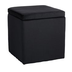 a large black ottoman with a cushion on the top and bottom, sitting in front of a white background