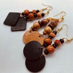 Wood bead Earrings came in printed designs on beads. Earrings hang  at 2in long. Very light weight. Adjustable Dangle Earrings With Black Beads, Multicolor Dangle Beaded Earrings With Wooden Beads, Wooden Beads Dangle Earrings, Multicolor Wooden Beads Dangle Earrings, Wooden Beads Drop Earrings, Gift Wooden Beaded Earrings, Adjustable Wooden Bead Drop Earrings, Adjustable Wooden Beaded Earrings As Gift, Gift Wooden Beaded Round Earrings