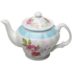 a tea pot with flowers painted on it