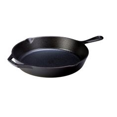 an empty frying pan on a white background