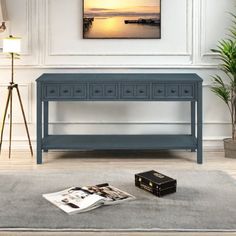 a living room scene with focus on the coffee table and magazine rack in the foreground