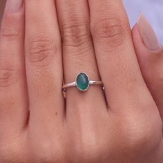 "Green Onyx Ring / 925 Sterling Silver Ring / Oval Shaped Ring / Dainty Ring / Cabochon Jewelry / Handmade Ring / Gift For Her Gemstone Name -Green Onyx Stone Quality - AAA Ring Wight - 1.65 gm  stone Length - 0.6 cm   stone Width - 0.4 cm  Stone Shape - As shown in the picture Ring Size - All Ring Size Available You'll get the exact product as shown in the pictures We serve complete 925 sterling silver Jewelry and genuine properties of the stone. The products are dispatched from the small business from USA. Product Quality and Packaging - Our all products are 925 Silver Stamped which shows that the product is genuine and authentic .The products are dispatched from the small business from USA so you get the product on time and the product packaging comes in bubble foil wrap with all the pr Oval Cabochon Rings For May Birthstone, May Birthstone Rings In Oval Cabochon Shape, May Birthstone Oval Cabochon Rings For Gift, Oval Cabochon Emerald Ring Gift, Silver Oval Cabochon Emerald Ring, Oval Sterling Silver Stackable Rings For May Birthstone, Oval May Birthstone Rings For Everyday, Oval Cabochon Emerald Ring In Silver, Dainty Handmade Oval Rings