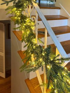 christmas garland on the banister with lights