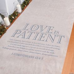 a white memorial with the words love is patient written on it