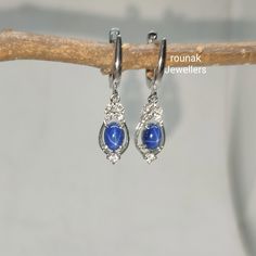 BAND- ROUNAK JEWELLERS MATERIAL- 925 STERLING SILVER GEMSTONE - LAB BLUE STAR SAPPHIRE, CUBIC ZIRCONIA BLUE STAR SAPPHIRE STONE WEIGHT - 2.30 CT SAPPHIRE STONE SIZE - 5 X 7 MM CUBIC ZIRCONIA STONE SIZE - 1.30/ 2.50 MM CUBIC ZIRCONIA STONE WEIGHT - 0.25 CT EARRINGS WEIGHT - 4.070 GM STONE SHAPE - OVAL, ROUND GEM COLOUR - BLUE, WHITE PLEASE GIVE YOUR OPENION OR FEEDBACK ABOUT THE PRODUCT. WE ACCEPT BULK ORDER ALSO. https://www.etsy.com/in-en/shop/RounakJewellers?ref=search_shop_redirect Silver Sapphire Drop Earrings, Oval Sapphire Earrings Hallmarked, Sapphire Dangle Earrings In Sterling Silver, Silver Sapphire Earrings With Gemstones, Fine Jewelry Oval Sterling Silver Earrings, Sapphire Sterling Silver Dangle Earrings, Oval Sterling Silver Earrings Fine Jewelry, Sapphire Sterling Silver Drop Earrings, Sapphire Sterling Silver Hoop Earrings