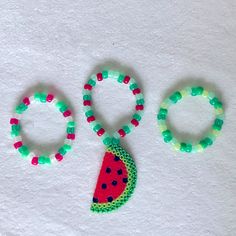 Trio Of Adorable Watermelon Slice Edm Rave Candy Bracelets. Made With Glow In The Dark And Sparkle Beads. Bracelets Glow Under Black Light. Stretchy Elastic. Yum-Yum! Ooak; The One Posted Is The One You Get Handmade; Not Dolls Kill Rave Candy Bracelets, Kandi Tut, Rave Kandi Bracelets, Rave Candy, Candy Bracelets, Rave Kandi, Perler Designs, Candy Bracelet, Bff Bracelets