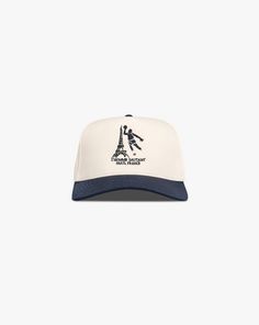 Pirate L'Homme Sautant Hat Size: Adjustable Snapback Cap Color: Cream/Navy Front Design Embroidery Stitch Count: 6,001 Embroidery Color: Black, White Hat Cream, Embroidery Stitch, Design Embroidery, Snapback Cap, Front Design, Hat Sizes, Embroidery Stitches, Black White, Embroidery