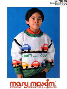 a young boy wearing a sweater with cars on it and the words mary moxvim