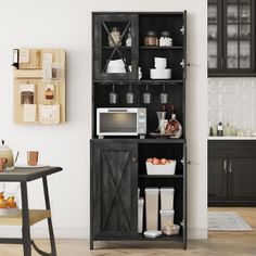 This tall bar cabinet is a versatile storage solution for your home. It features a wine rack, open shelves, and a cabinet with hidden shelves to store and display your kitchen, dining, or bar essentials. Tall Bar Cabinet, Free Standing Kitchen Cabinets, Tall Bar, Microwave Stand, Pantry Storage Cabinet, Kitchen Pantry Storage, Sideboard Storage Cabinet, Freestanding Kitchen, Buffet Sideboard