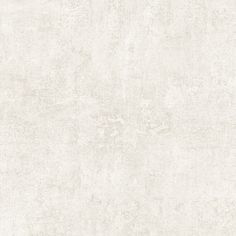 an old white wallpaper background with faded edges