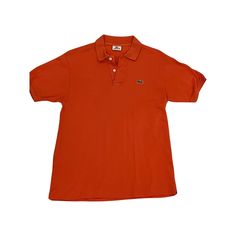 Get your street style on with this vintage Lacoste orange polo t-shirt! Unleash the vibrant spirit of authentic Lacoste fashion in bold, bright orange. Elevate your look and turn heads wherever you go  it's more than just a shirt, it's a statement!  TAG READS: Lacoste, size 4, Devenlay, Made in France, 100% Cotton Keep in mind vintage tag sizes vary from modern day sizing. MEASUREMENTS   (Taken in inches lying flat are approximately) LENGTH: 27 inches Measure from top to bottom. SHOULDERS: 18 in Orange Y2k, Y2k Streetwear Fashion, Lacoste Vintage, Vintage Lacoste, Polo Orange, Etiquette Vintage, Polo Lacoste, Y2k Streetwear, Vintage Polo