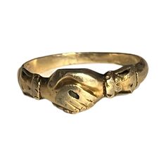 The Fede Ring Has A Long History Dating Back To Antiquity. The Major Hallmark Of This Type Of Ring Is The Motif Of Two Hands Traditionally One Female And The Other Male, Clasped Together. Known From The Original Italian “Mani In Fede” (Hands In Faith And Trust), This Style Of Ring Was Popular During The Renaissance And Given As A Token Of Betrothal. This 15ct Gold Ring Dates From Around 1820. A Charming And Rare Ring. Great Condition Ring Size 6 Fede Ring, Jewelry Antique, Long History, Brand Jewelry, Types Of Rings, No Brand, Womens Jewelry Rings, Jewelry Branding, Two Hands