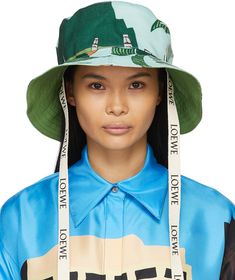 Loewe: Blue Ken Price Edition Easter Island Fisherman Hat | SSENSE Ken Price, Kenzo Clothing, Bucket Hat Design, Fisherman's Hat, Browning Logo, Black Tigers, Easter Island, Blue Graphic, Fishing Hat