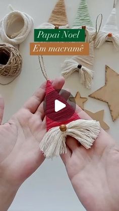 someone is making christmas decorations out of yarn