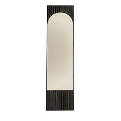 a tall black and white mirror with an arched design on the front, against a white background