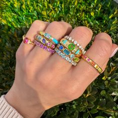 Add a pop of color to your jewelry collection with our Mosaic 18K Gemstone Gypsy Ring! This unique and playful ring features multi-colored pear cut gemstones set in a mosaic design on an 18K gold band. Perfect for stacking or making a statement on its own, this ring adds 0.97 ct of gemstone elegance to any outfit. Ring Stacks Gold, Colorful Engagement Ring, Ring Stacking Ideas, Raver Outfits, Whimsical Ring, Colorful Rings, Pop Jewelry, Ring Stacks, Ring Pop