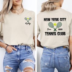 two women wearing new york city tennis club t - shirts, one in white and the other in beige