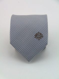 "Mens 100% sill silver on silver necktie. Available as a extra long tie. Handmade from 100% silk, this special collection features a .75\" Eds Neckties logo at the bottom right front corner of every tie and a larger logo located on the tipping (Back of the tie). The label features the collection name (Nathaniel Alexandria) Named after my son Nathaniel and my daughter Alexandria. Expertly hand-made from 100% silk you can select your length from 57\" to 63\" (Great for taller Men). Width is standa Great Gifts For Men, Mens Neck Ties, Gifts For Men, My Son, Necktie, Extra Long, Neck Tie, Great Gifts, For Men