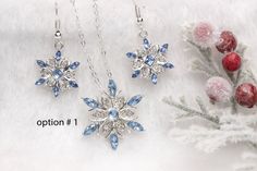 Actual color is baby blue---super elegant Brings dazzling sparkle to any holiday occasion. Created from rhodium plated, sculpted metal and blue cubic zirconia. This delicate silver snowflake charm is the perfect gift for all occasions and for girls and women of all ages. Whether she's a winter baby, a snow lover, skier, snowboarder, or just stylish, the snowflake is the perfect symbol for unique and delicate beauty. This necklace is slightly larger than a nickel. Small and Dainty 17 in necklace Blue Snowflake Sterling Silver Necklace, Christmas Silver Cubic Zirconia Necklace, Silver Cubic Zirconia Necklaces For Christmas, Silver Snowflake Necklace With Cubic Zirconia, Silver Cubic Zirconia Snowflake Necklace, Silver Snowflake Necklace For Holiday, Snowflake Cubic Zirconia Jewelry For Anniversary, Cubic Zirconia Snowflake Jewelry For Anniversary, Blue Sparkling Cubic Zirconia Jewelry