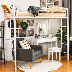 a white loft bed with a desk and chair in the corner next to an ottoman