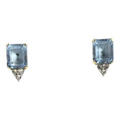 Beautifully made costume clip earrings with faceted emerald cut blue glass accented with 3 round shaped clear crystals on the bottom. No posts/ clip on earrings    Due to the unique nature of this product, all sales are final. This item is not eligible for the standard Chairish return policy. Blue Emerald Cut Earrings For Formal Occasions, Made Costume, Aquamarine Crystal, Unique Nature, Decor Guide, Aqua Marine, Clear Crystals, Modern Traditional, Clip Earrings