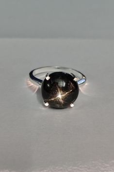 Gemstone Black Star Sapphire Stone Type Natural Gemstone Size 13x13mm Stamped 925 Metal 925 Sterling Silver Shape Round Star Sapphire Stone, Black Star Sapphire, Star Sapphire Ring, Engagement Rings For Women, Star Sapphire, Sterling Silver Engagement Rings, Silver Engagement Rings, Sapphire Stone, Black Star