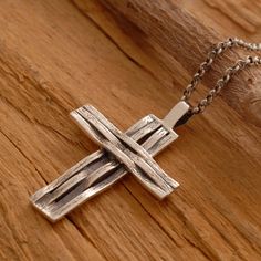 Custom handcrafted in the finest detail, this handmade sterling silver men's cross necklace is a flawless accessory that is stunning when worn. Suspended from a sterling silver chain or a black leather cord, the cross pendant combines the beauty of both polished and oxidized sterling silver in a compelling display of design. Scrupulous attention to detail is what makes this cross necklace unique and endearing. Gift it to that special man in your life as a riveting symbol of his faith. Cross meas Necklace Christian, Mens Cross Necklace, Faith Cross, Mens Crosses, Christian Cross, Necklace Unique, Christian Jewelry, Jewelry Sterling Silver, Sterling Silver Mens