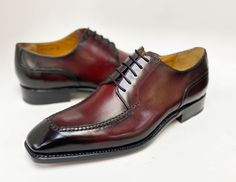 Style: 20141-2002-Burgundy Simple, Elegant, Stunning! Completely Handmade, this Hand Burnished Calfskin lace-up oxford from the Ugo Vasare collection features Goodyear Welted construction, soft Calfskin lining, cushioned insole, Split-Toe, a stitched welt and a full Leather sole! Matching Belt Available. Don't see your size? Call us to arrange a Special Order in Your Size. Cordovan Shoes, Oxford Shoe, Bespoke Shoes, Shoe Horn, Shoe Tree, Goodyear Welt, Simple Elegant, Horse Hair, Suede Shoes