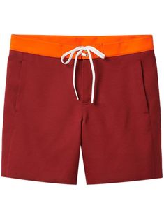 brick red/pumpkin orange satin weave appliqué logo elasticated drawstring waistband front press-stud and zip fastening two side welt pockets rear flap pocket unlined knee-length straight hem