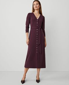 Flowy and flattering, our button front knit midi dress is a wardrobe classic that works anywhere. V-neck. Long sleeves. Button front. Self tie belt.,Hit:32" from natural waist,Imported:Imported,Fit:Hits at mid-calf,Length:32" from natural waist,Fabrication:95% Polyester, 5% Spandex,Garment Care:Machine Washable Button V-Neck Flare Knit Midi Dress by Ann Taylor Size regular - XL Plum Rose Women's Fit, Flare, Regular, V-Neck, Long, Sleeve, Dresses, 95%, Polyester, 5%, Spandex, Machine, Washable Clothes Making, Wardrobe Classic, Blazer And Skirt, Long Sleeve Dresses, Feminine Dress, Sleeve Dresses, Knit Midi, Knit Midi Dress, Petite Fashion