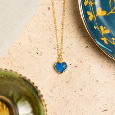 Blue Chalcedony Mini Heart Pendant - Heart shape gemstone pendant with vermeil gold bezel - Jewelry gifts for her, mom, wife, daughter Stone: Genuine Blue Chalcedony Heart Gemstone: 10mm x 10mm Gold chain: 14k gold filled Chain length: 16-18 inches adjustable Clasp: spring ring Bezel: Vermeil Gold About "Gold Filled Jewelry": Also called rolled-gold. These jewelry items are not actually filled with gold. They are made of a base metal covered by sheets of gold in a mechanical bonding process. Eff Blue Heart Charm Necklaces, Sapphire Necklace For Valentine's Day Gift, Blue Heart Charm Necklace, Blue Heart Pendant Necklace With Birthstone, Blue Birthstone Heart Pendant Necklace, Blue Heart Pendant Necklace For Mother's Day, Blue Gemstone Heart Necklace For Gift, Blue Birthstone Charm Necklaces As Gift, Blue Birthstone Charm Necklaces For Gift