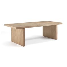 a wooden table sitting on top of a white floor