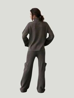 Elevate your loungewear game with the Crescent Zoey Sweater, the ideal companion to the Zoey Bottoms. This luxurious turtleneck sweater is designed for the modern woman who seeks comfort without compromising style. Crafted from a premium blend of acrylic and wool, the sweater offers a relaxed fit that drapes beautifully on the body. Long sleeves with folded cuffs add a touch of sophistication, while slits at the sides ensure ease of movement. Pair it with the Zoey Bottoms for a complete Zoey Car Sweater Lounge Set, Sweater Lounge, Elastic Casing, Workwear Essentials, Stylish Pants, Long Jumpsuits, Cargo Pant, Pants Design, Lounge Set