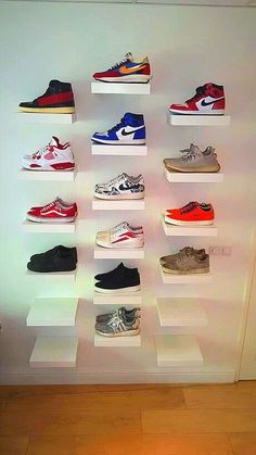 there are many different shoes on the shelves