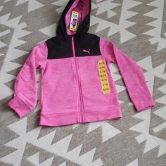 Puma Youth Fleece Hoodie7 Size: Small 7/8, Color: Pink & Black Brand New, With Tags Attached. Nwt Full Zip Fleece Hoodie Windbreaker Polar Fleece Lining Brand Logo At Left Chest Front Hand Pockets 100% Polyester. Machine Wash, Tumble Dry. Imported. Pink Fleece Hoodie For Sportswear, Pink Fleece Sportswear Hoodie, Pink Fleece Hoodie Sportswear, Pink Sports Hoodie Outerwear, Pink Fleece Sporty Activewear, Pink Sporty Fleece Activewear, Sporty Pink Fleece Activewear, Pink Fleece Activewear Athleisure Style, Pink Fleece Athleisure Activewear