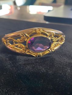 Antique Cuff Bracelet with a giant Amethyst. Old and vintage. Could be gold-filled but isn't marked (they didn't mark jewelry at the time it was made) I'd say before the turn of the century Victorian Bracelet, Painting Purple, Turn Of The Century, Madison Wi, Cuff Bracelet, Cuff Bracelets, Gold Filled, Beauty Book, Jewelry Bracelets