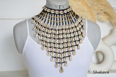 Unique Shell-shaped Necklace For Festivals, Unique Shell Necklace For Festival, Bohemian Cowrie Shell Choker, Bohemian Cowrie Shell Choker For Festivals, Bohemian Cowrie Shell Beaded Necklace For Festival, Bohemian Cowrie Shell Necklace For Festivals, Bohemian Beaded Shell Choker Necklace, Bohemian Adjustable Bib Necklace Choker, Handmade Shell Beaded Choker Necklaces