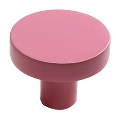 a pink round knob on a white background